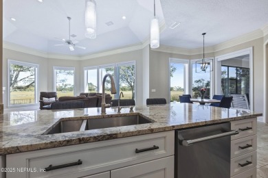 Custom elegant home offers a grand entry flowing into spacious on Marsh Landing Country Club - Saint Johns County in Florida - for sale on GolfHomes.com, golf home, golf lot