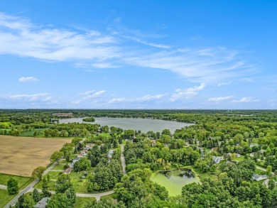 Stunning 2-story home features vaulted ceilings and a spacious on Hankerd Hills Golf Course in Michigan - for sale on GolfHomes.com, golf home, golf lot