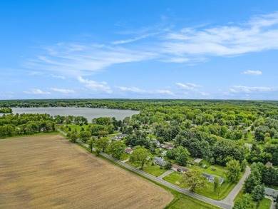 Stunning 2-story home features vaulted ceilings and a spacious on Hankerd Hills Golf Course in Michigan - for sale on GolfHomes.com, golf home, golf lot