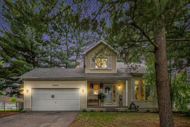 Stunning 2-story home features vaulted ceilings and a spacious on Hankerd Hills Golf Course in Michigan - for sale on GolfHomes.com, golf home, golf lot