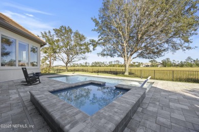 Custom elegant home offers a grand entry flowing into spacious on Marsh Landing Country Club - Saint Johns County in Florida - for sale on GolfHomes.com, golf home, golf lot