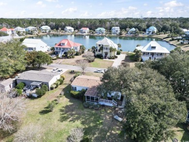 Beautiful 3 bedroom 2 bath home on one of the most peaceful lake on Wachesaw Plantation East Golf Course in South Carolina - for sale on GolfHomes.com, golf home, golf lot