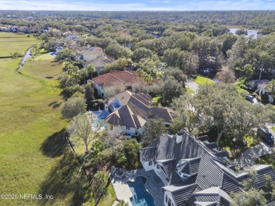 Custom elegant home offers a grand entry flowing into spacious on Marsh Landing Country Club - Saint Johns County in Florida - for sale on GolfHomes.com, golf home, golf lot