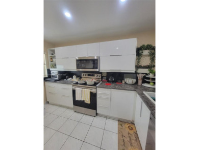 2/2 well-kept unit with remodeled kitchen and updated modernized on Pine Island Ridge Country Club in Florida - for sale on GolfHomes.com, golf home, golf lot