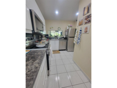 2/2 well-kept unit with remodeled kitchen and updated modernized on Pine Island Ridge Country Club in Florida - for sale on GolfHomes.com, golf home, golf lot