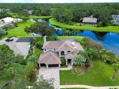 Under contract-accepting backup offers. TASTEFULLY on Tampa Palms Golf and Country Club in Florida - for sale on GolfHomes.com, golf home, golf lot