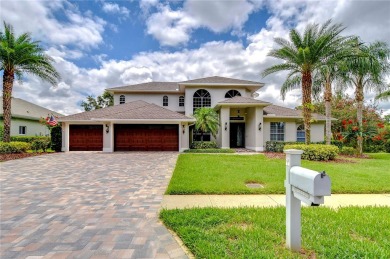 Under contract-accepting backup offers. TASTEFULLY on Tampa Palms Golf and Country Club in Florida - for sale on GolfHomes.com, golf home, golf lot