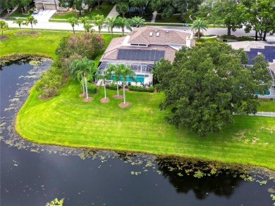 Under contract-accepting backup offers. TASTEFULLY on Tampa Palms Golf and Country Club in Florida - for sale on GolfHomes.com, golf home, golf lot