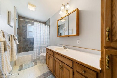 Charming Hayden Lake Home Across from Golf Course - No HOA or on Avondale Golf and Tennis Club in Idaho - for sale on GolfHomes.com, golf home, golf lot