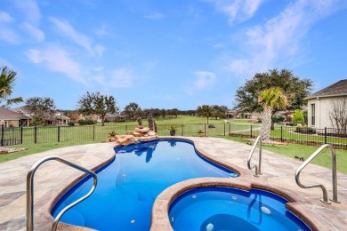 Step right off the 9th hole into your backyard for a barbecue! on The Golf Club at Resort Eagle Mountain Lake in Texas - for sale on GolfHomes.com, golf home, golf lot