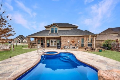 Step right off the 9th hole into your backyard for a barbecue! on The Golf Club at Resort Eagle Mountain Lake in Texas - for sale on GolfHomes.com, golf home, golf lot