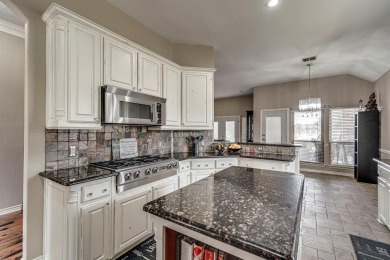 Step right off the 9th hole into your backyard for a barbecue! on The Golf Club at Resort Eagle Mountain Lake in Texas - for sale on GolfHomes.com, golf home, golf lot