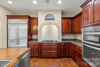 Absolutely stunning home gracefully situated on 1.38 beautifully on Kenmure Country Club in North Carolina - for sale on GolfHomes.com, golf home, golf lot