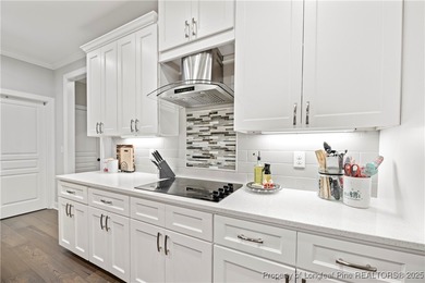 Experience luxury, comfort, and exceptional functionality in on Anderson Creek Golf Club in North Carolina - for sale on GolfHomes.com, golf home, golf lot