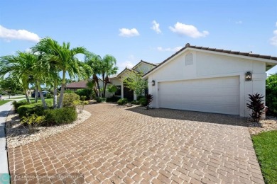 Welcome to your dream home in beautiful Boca Woods Country Club! on Boca Woods Country Club in Florida - for sale on GolfHomes.com, golf home, golf lot