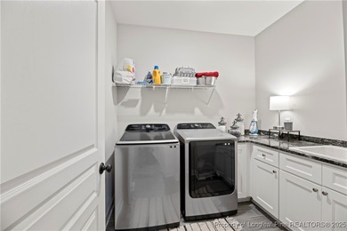 Experience luxury, comfort, and exceptional functionality in on Anderson Creek Golf Club in North Carolina - for sale on GolfHomes.com, golf home, golf lot