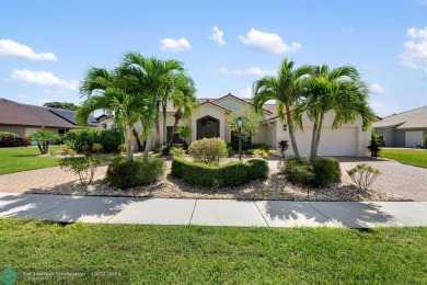 Welcome to your dream home in beautiful Boca Woods Country Club! on Boca Woods Country Club in Florida - for sale on GolfHomes.com, golf home, golf lot