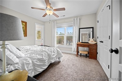 Experience luxury, comfort, and exceptional functionality in on Anderson Creek Golf Club in North Carolina - for sale on GolfHomes.com, golf home, golf lot