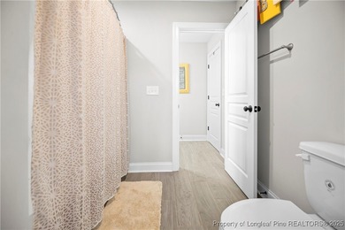 Experience luxury, comfort, and exceptional functionality in on Anderson Creek Golf Club in North Carolina - for sale on GolfHomes.com, golf home, golf lot