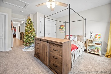 Experience luxury, comfort, and exceptional functionality in on Anderson Creek Golf Club in North Carolina - for sale on GolfHomes.com, golf home, golf lot