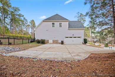Experience luxury, comfort, and exceptional functionality in on Anderson Creek Golf Club in North Carolina - for sale on GolfHomes.com, golf home, golf lot