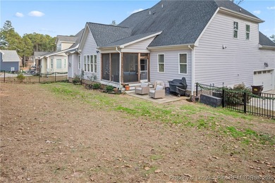 Experience luxury, comfort, and exceptional functionality in on Anderson Creek Golf Club in North Carolina - for sale on GolfHomes.com, golf home, golf lot