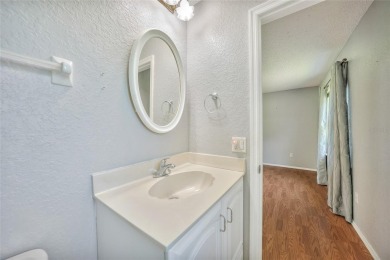 Move-in ready 3-bedroom, 2-bathroom single-family home with on Duffys Golf Center in Florida - for sale on GolfHomes.com, golf home, golf lot