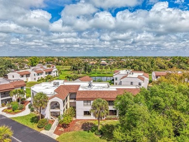 Appealing two bedroom, two bath, first floor, end unit, in the on Capri Isle Golf Club in Florida - for sale on GolfHomes.com, golf home, golf lot