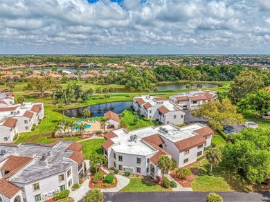 Appealing two bedroom, two bath, first floor, end unit, in the on Capri Isle Golf Club in Florida - for sale on GolfHomes.com, golf home, golf lot