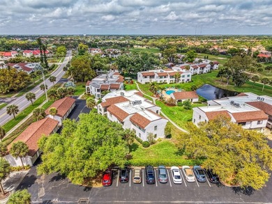 Appealing two bedroom, two bath, first floor, end unit, in the on Capri Isle Golf Club in Florida - for sale on GolfHomes.com, golf home, golf lot