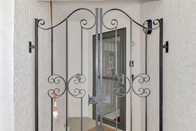 Appealing two bedroom, two bath, first floor, end unit, in the on Capri Isle Golf Club in Florida - for sale on GolfHomes.com, golf home, golf lot