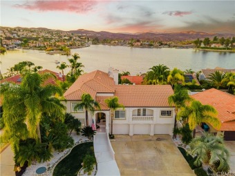 This lake view home blends Mediterranean sophistication on Canyon Lake Country Club in California - for sale on GolfHomes.com, golf home, golf lot