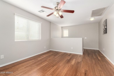 WELCOME HOME! This 4 BR/2.5 BA newly painted two-story home on Poston Butte Golf Club in Arizona - for sale on GolfHomes.com, golf home, golf lot