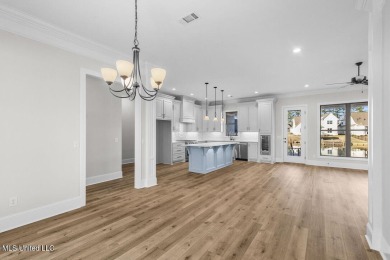 Welcome to this stunning new construction lakefront home in Lake on Lake Caroline Golf Club in Mississippi - for sale on GolfHomes.com, golf home, golf lot