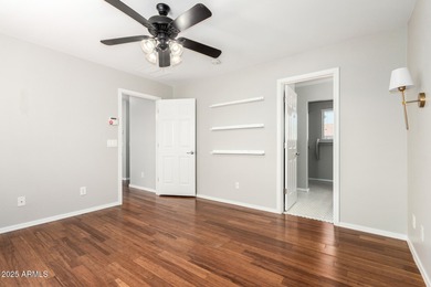 WELCOME HOME! This 4 BR/2.5 BA newly painted two-story home on Poston Butte Golf Club in Arizona - for sale on GolfHomes.com, golf home, golf lot