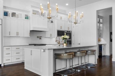 Experience refined Mediterranean-inspired living in this on TPC Four Seasons - Las Colinas Resort in Texas - for sale on GolfHomes.com, golf home, golf lot