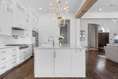 Experience refined Mediterranean-inspired living in this on TPC Four Seasons - Las Colinas Resort in Texas - for sale on GolfHomes.com, golf home, golf lot