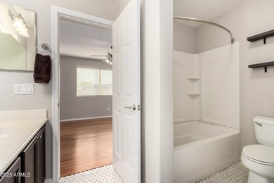 WELCOME HOME! This 4 BR/2.5 BA newly painted two-story home on Poston Butte Golf Club in Arizona - for sale on GolfHomes.com, golf home, golf lot