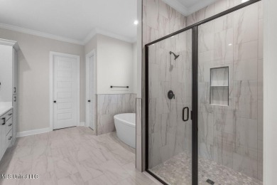 Welcome to this stunning new construction lakefront home in Lake on Lake Caroline Golf Club in Mississippi - for sale on GolfHomes.com, golf home, golf lot