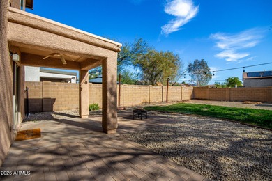 WELCOME HOME! This 4 BR/2.5 BA newly painted two-story home on Poston Butte Golf Club in Arizona - for sale on GolfHomes.com, golf home, golf lot
