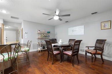 This home is located on the 5th hole of Pine Lakes Golf Course on The Grand Club - Pine Lakes Course in Florida - for sale on GolfHomes.com, golf home, golf lot