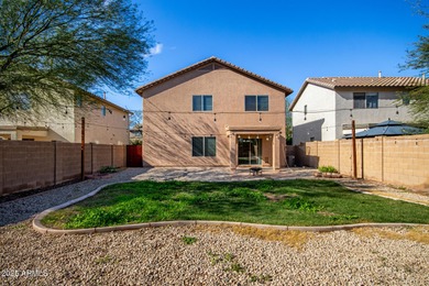 WELCOME HOME! This 4 BR/2.5 BA newly painted two-story home on Poston Butte Golf Club in Arizona - for sale on GolfHomes.com, golf home, golf lot