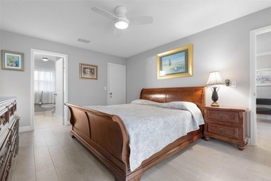 This home is located on the 5th hole of Pine Lakes Golf Course on The Grand Club - Pine Lakes Course in Florida - for sale on GolfHomes.com, golf home, golf lot