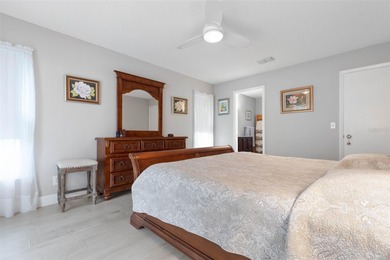 This home is located on the 5th hole of Pine Lakes Golf Course on The Grand Club - Pine Lakes Course in Florida - for sale on GolfHomes.com, golf home, golf lot