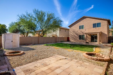 WELCOME HOME! This 4 BR/2.5 BA newly painted two-story home on Poston Butte Golf Club in Arizona - for sale on GolfHomes.com, golf home, golf lot