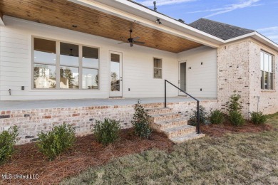 Welcome to this stunning new construction lakefront home in Lake on Lake Caroline Golf Club in Mississippi - for sale on GolfHomes.com, golf home, golf lot