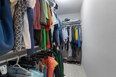 This home is located on the 5th hole of Pine Lakes Golf Course on The Grand Club - Pine Lakes Course in Florida - for sale on GolfHomes.com, golf home, golf lot