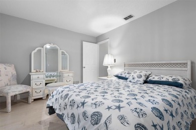 This home is located on the 5th hole of Pine Lakes Golf Course on The Grand Club - Pine Lakes Course in Florida - for sale on GolfHomes.com, golf home, golf lot