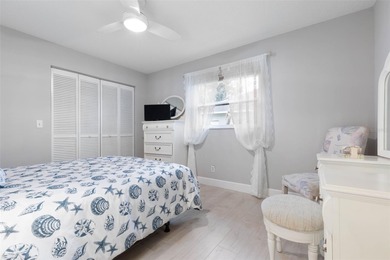 This home is located on the 5th hole of Pine Lakes Golf Course on The Grand Club - Pine Lakes Course in Florida - for sale on GolfHomes.com, golf home, golf lot