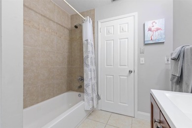 This home is located on the 5th hole of Pine Lakes Golf Course on The Grand Club - Pine Lakes Course in Florida - for sale on GolfHomes.com, golf home, golf lot